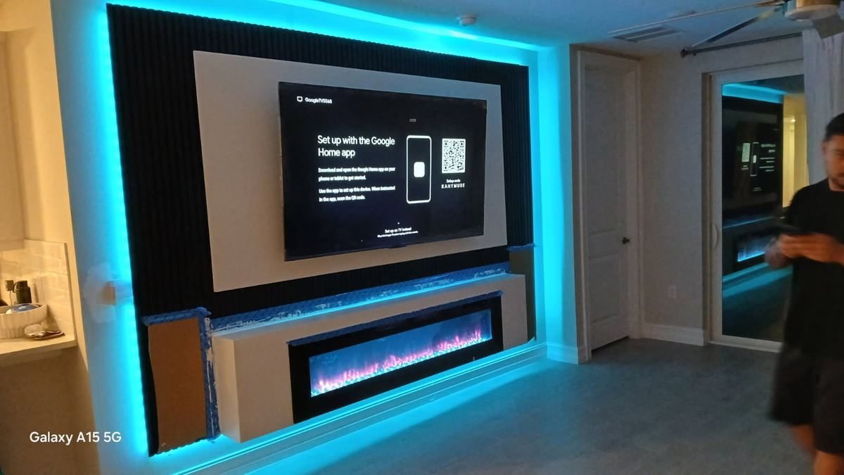 Custom built-in entertainment wall with fireplace
